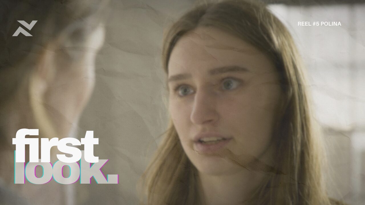 A close-up of a distressed young woman, with a preview caption overlay.